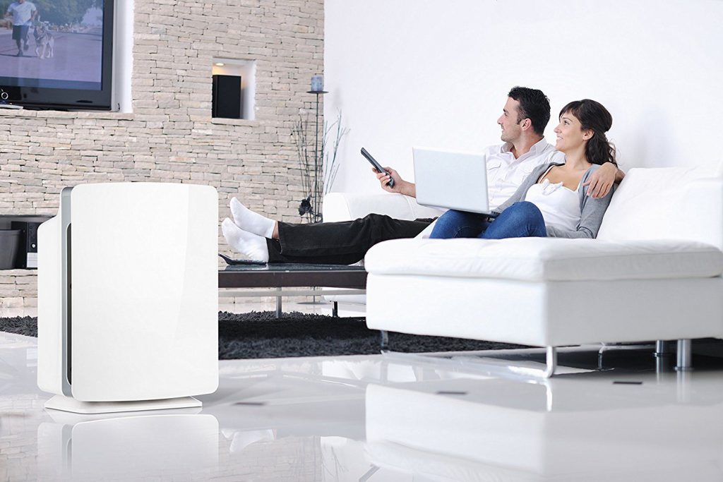 Air Purifier in the Home with Family on Sofa